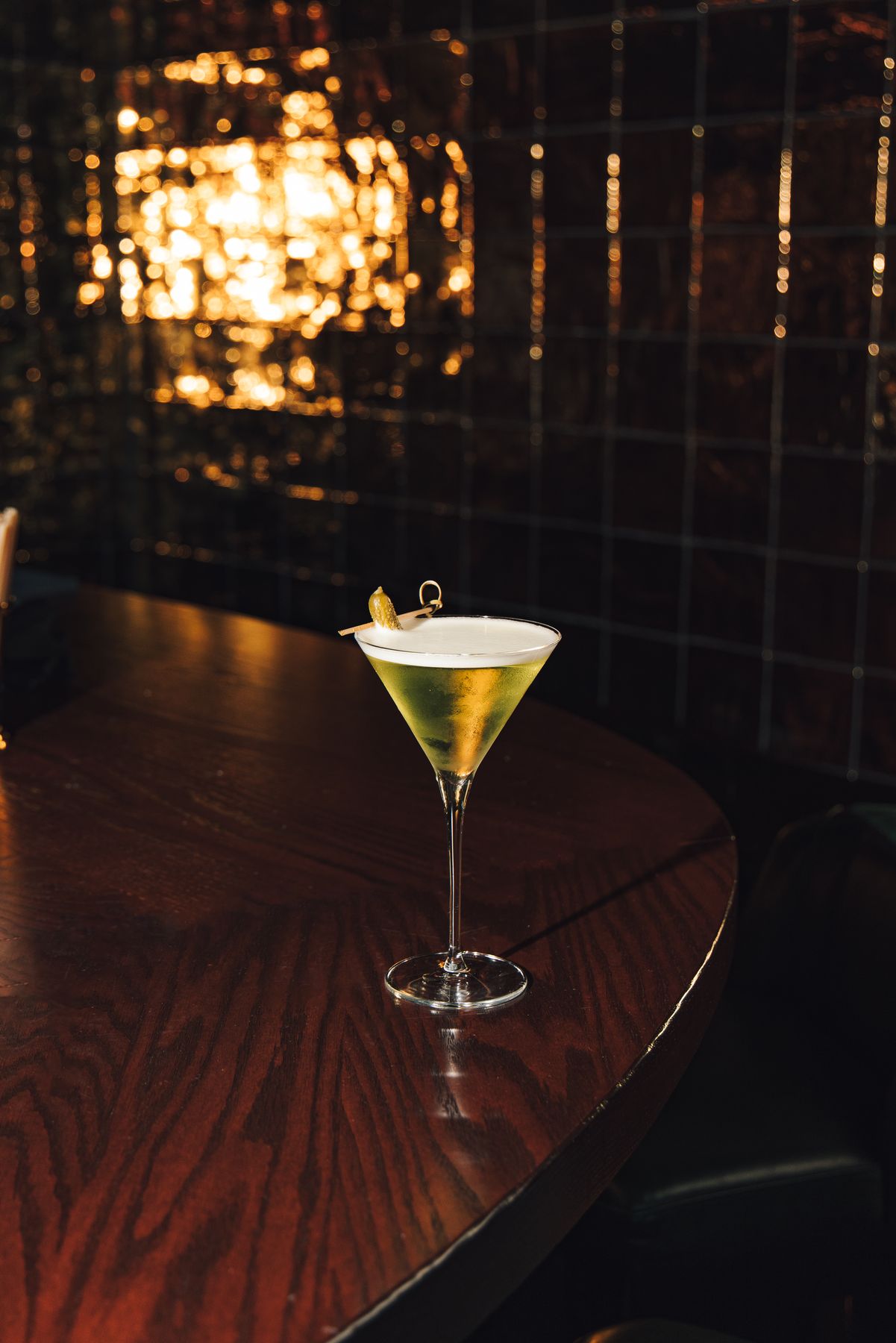 A martini on the bar from the bar at Sub-Mission NYC, beneath Mission Ceviche