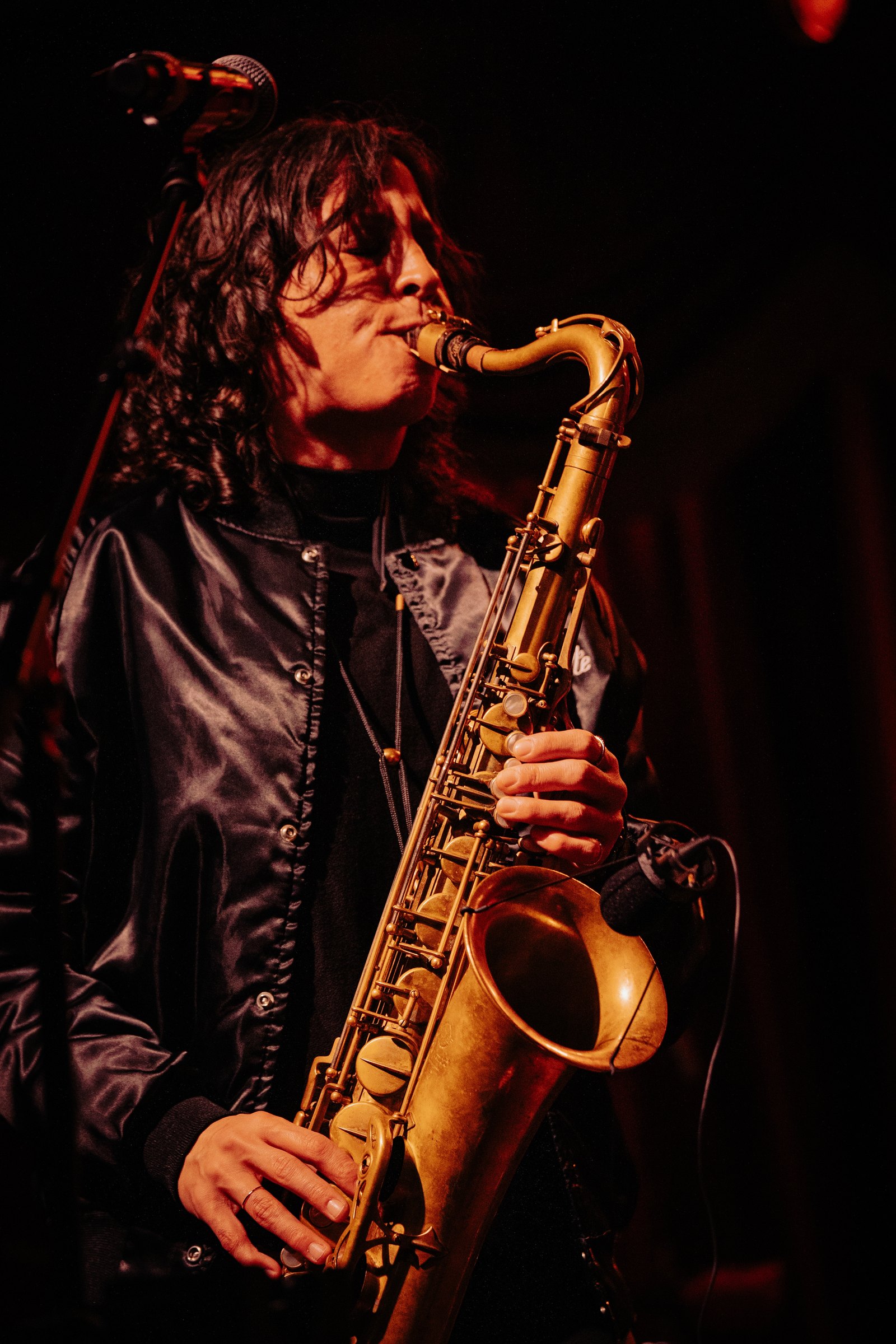A saxophonist playing the room during a live set at Sub-Mission NYC, Union Square
